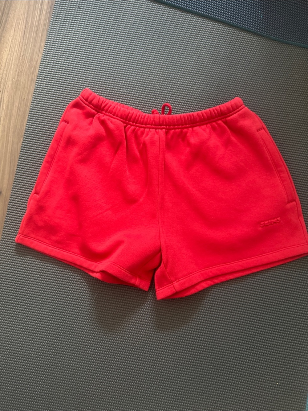 SKIMS Bright Washed Red Athletic Fleece Shorts